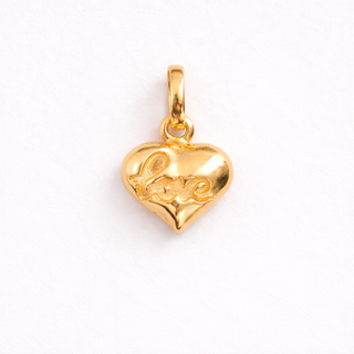 Dije Corazón tallado Oro 18k 2.29gr / 1.5cm x 1.0 cm